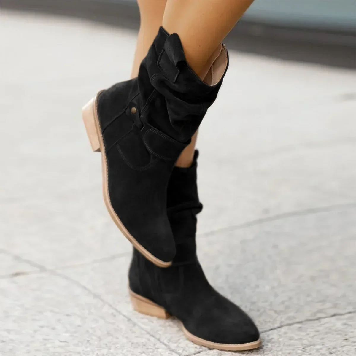 Harlow slouchy suede mid-calf boots in black, side view on model