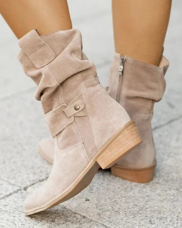 Harlow slouchy suede mid-calf boots in black, side view on model
