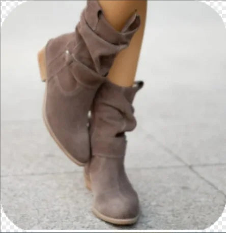 Harlow slouchy suede mid-calf boots in black, side view on model