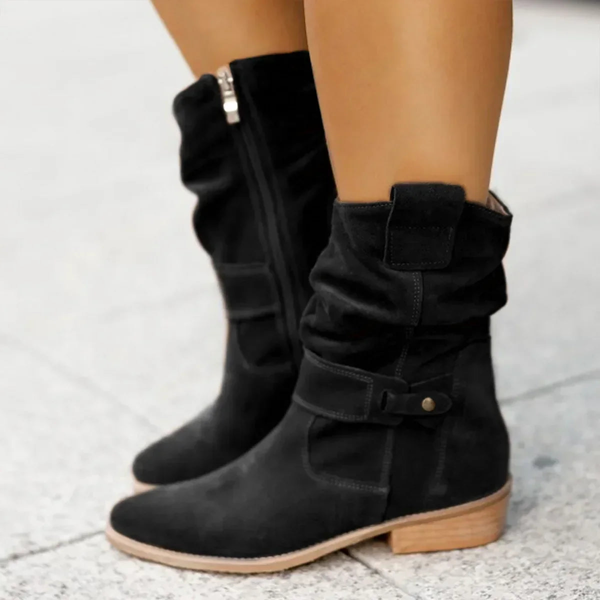 Harlow slouchy suede mid-calf boots in black, side view on model