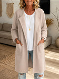 Odalys long cardigan in black, front view styled with jeans