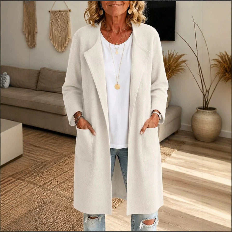 Odalys long cardigan in white, front view with hands in pockets