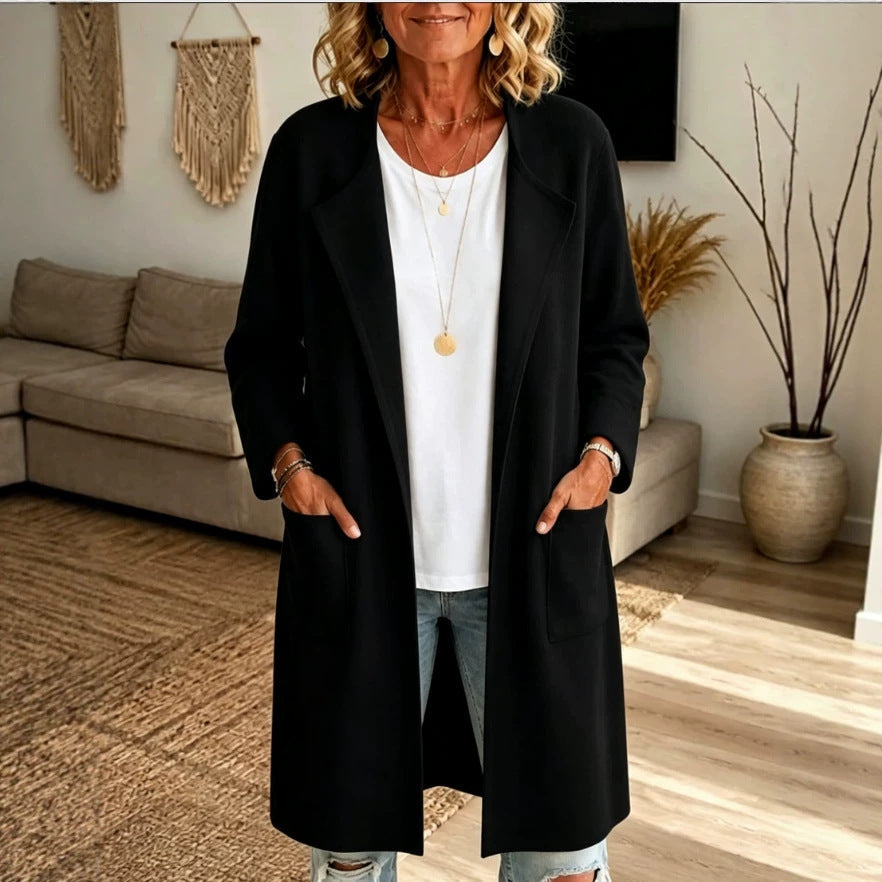 Odalys long cardigan in black, front view styled with jeans